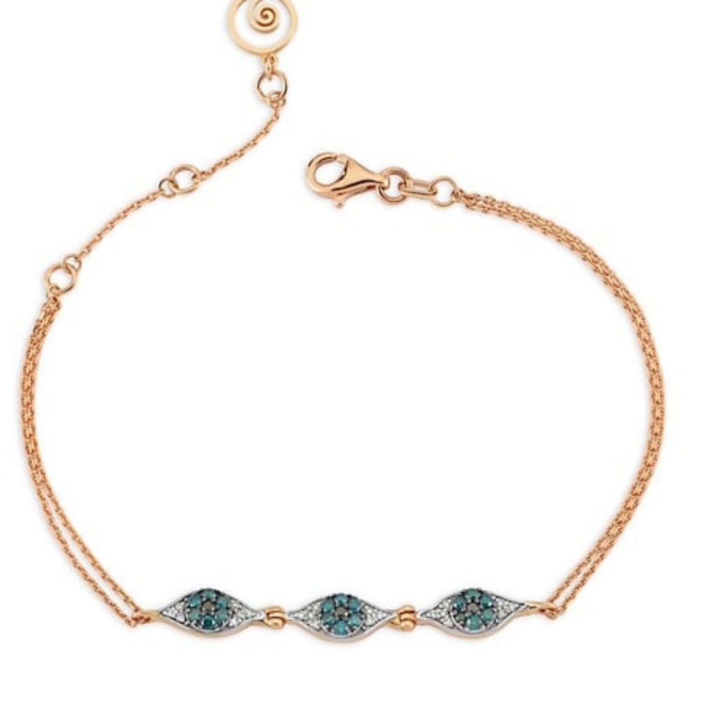 18 k gold , diamond and emerald bracelet